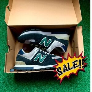 Black and Green New Balance 574s